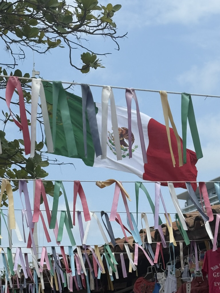 A large Mexican flag located at the cruise port in Puerto Vallarta.
